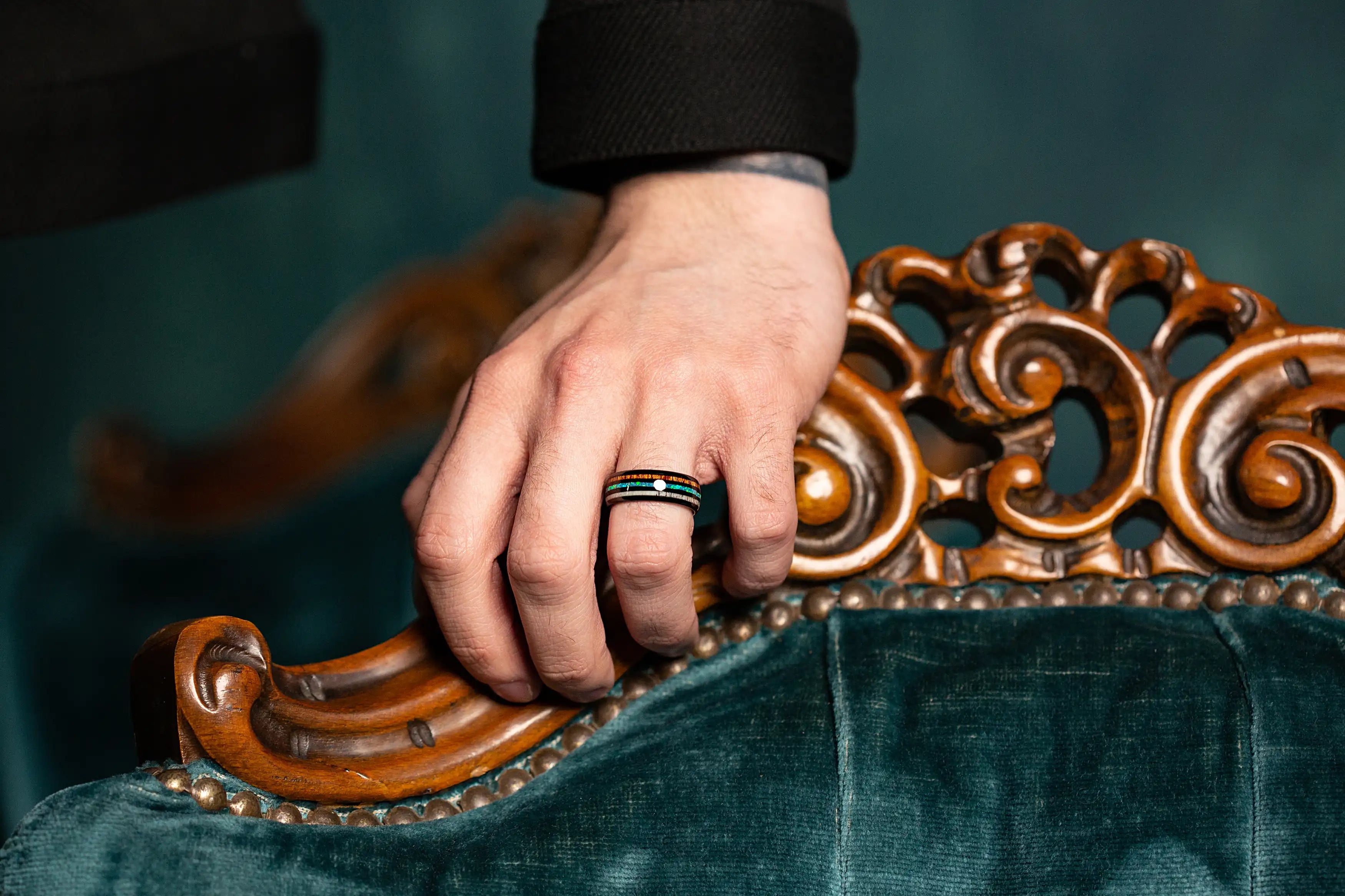 Hawaii wood and antler ring on a man's hand