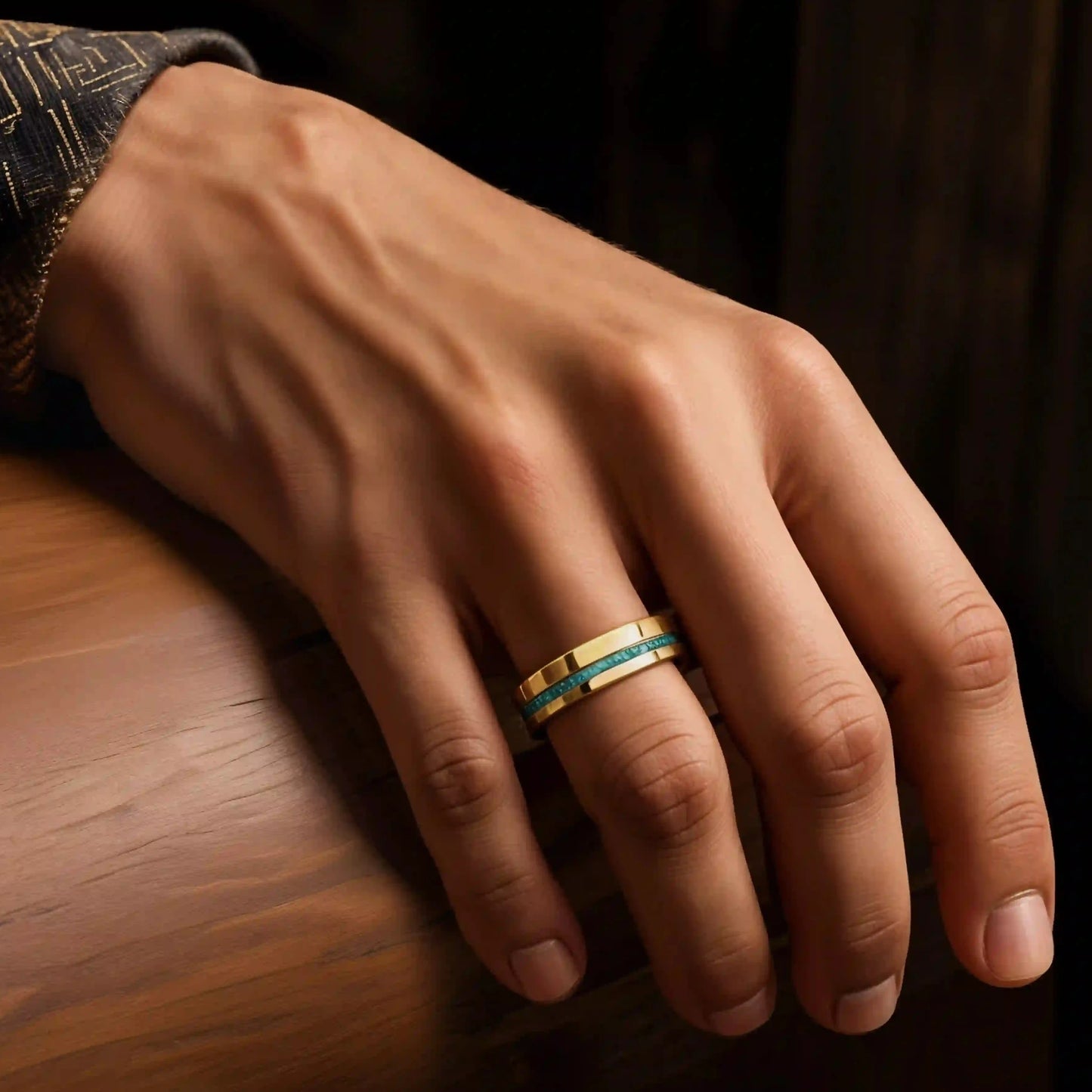 6mm gold tungsten ring with malachite. the ring is placed on a man's hand