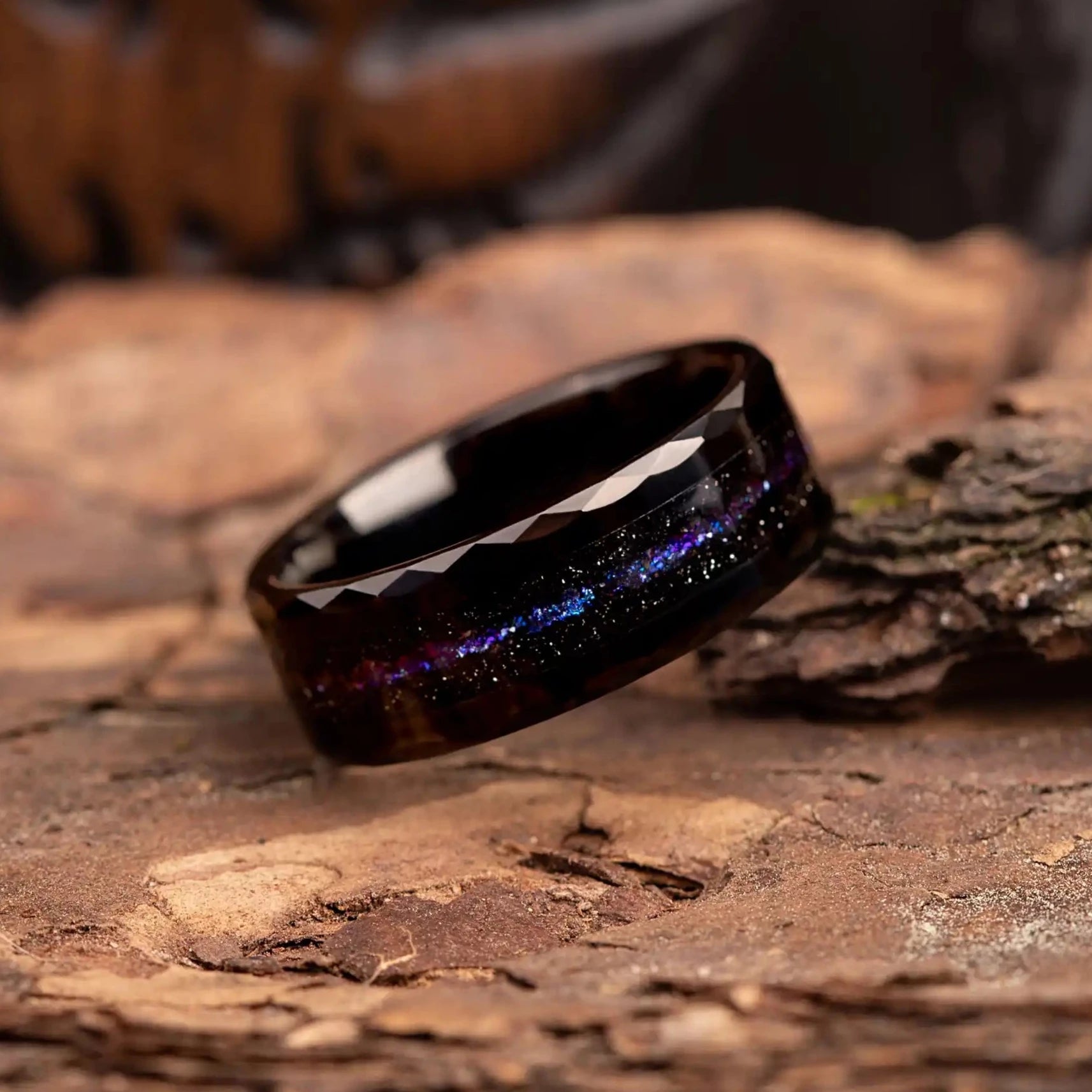 Side view of the handmade Orion Nebula Ring featuring a nebula-inspired design and durable tungsten carbide material in black