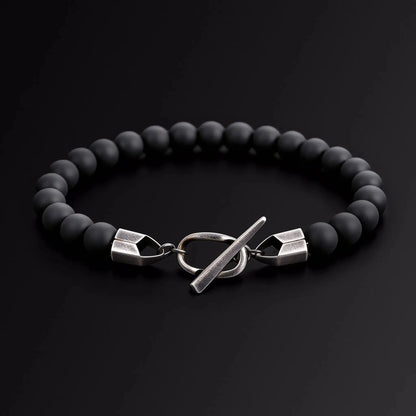 Black beaded bracelet with silver Japanese Melody
