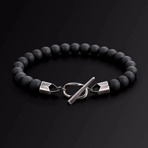 Black beaded bracelet with silver Japanese Melody