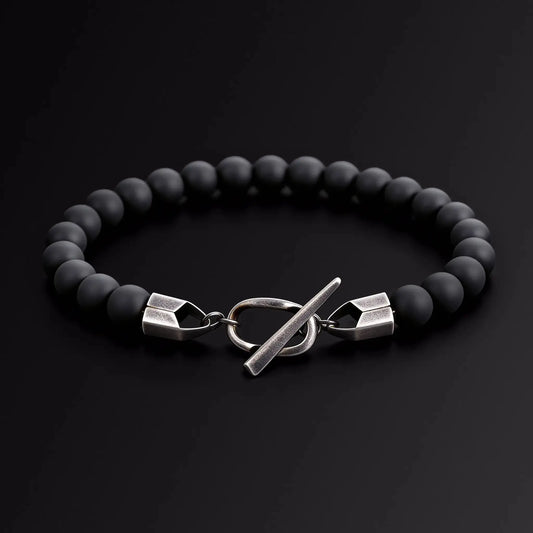 Black beaded bracelet with silver Japanese Melody