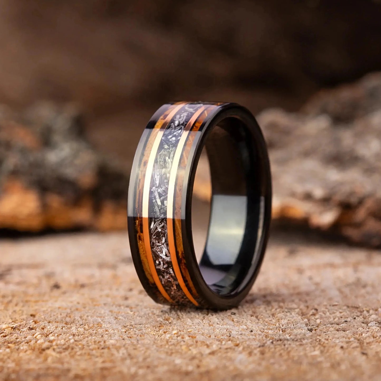 Wooden ring with black center on a wooden surface