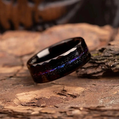 Side view of the handmade Orion Nebula Ring featuring a nebula-inspired design and durable tungsten carbide material in black