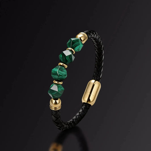 Bracelet with green beads and gold accents on a black background
