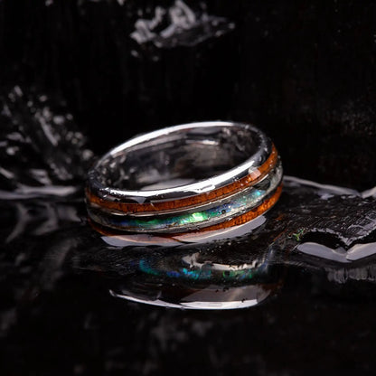 Brushed silver tungsten ring with abalone shell and koa wood