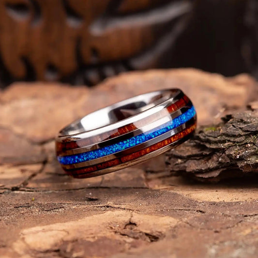 Silver tungsten ring with blue opal and whiskey barrel oak wood