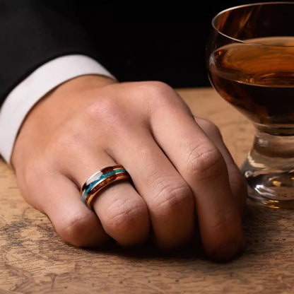 Ring made of hawaii Koa Wood, Opal and Tungsten on a man hand, which holding whiskey glass