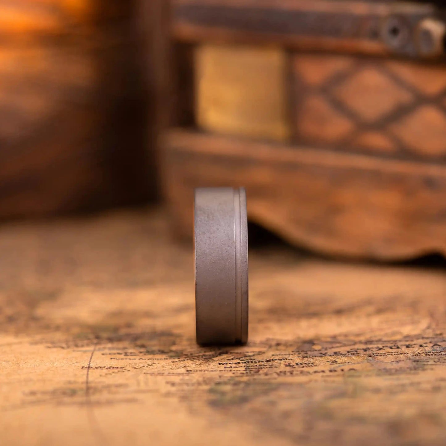 Handcrafted ring made of Oak Wood and Titanium. The ring has a width 8 mm