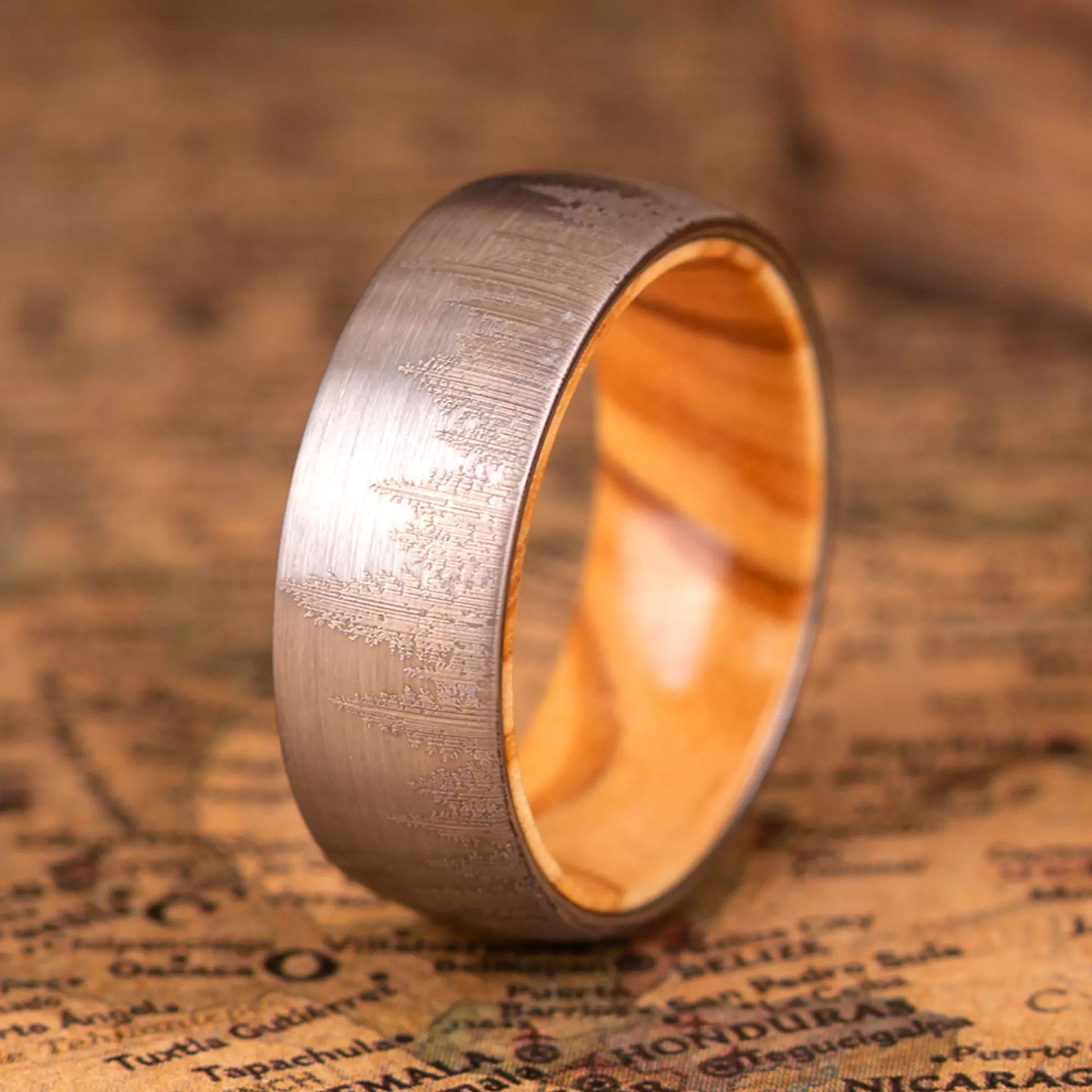 Ring is an original handcrafted piece made of Koa Wood and tungsten