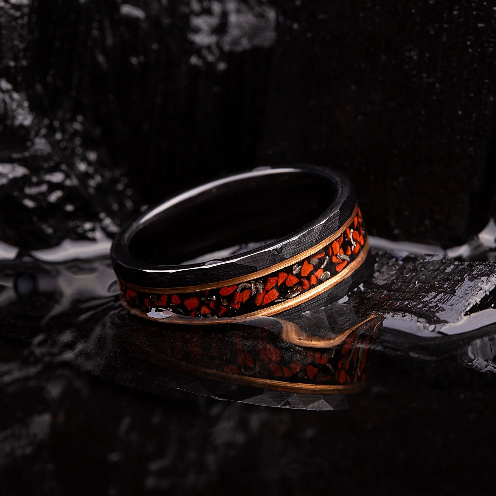 Black hammered tungsten ring with dinosaur bones and meteorite