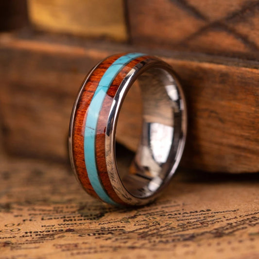 SIlver ring with turquoise and whiskey barrel oak wood in the central inlay