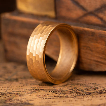 Faceted gold tungsten ring with walnut inlay